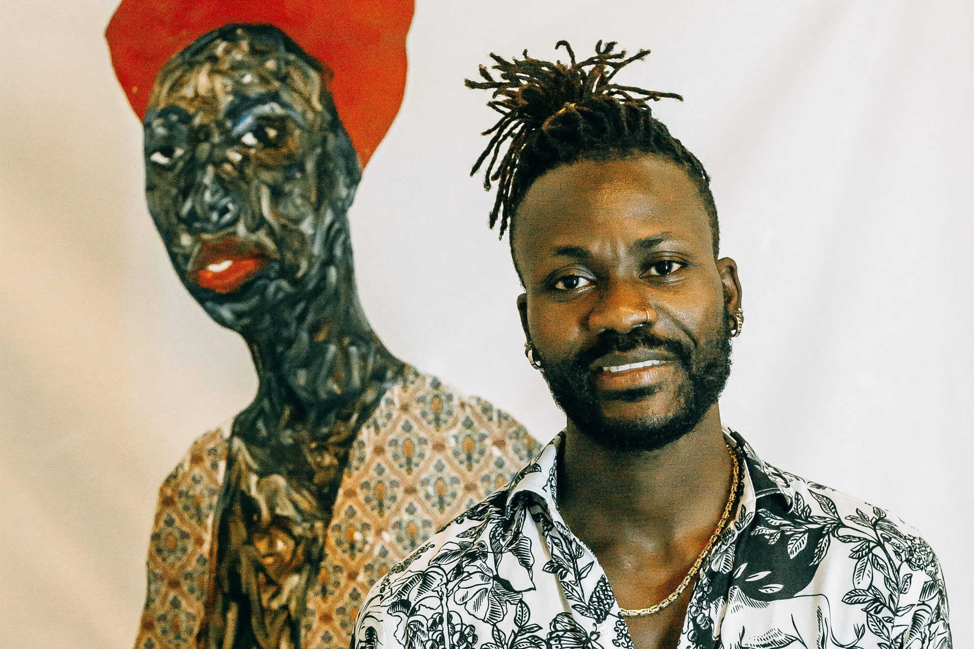 Amoako Boafo painting a bold portrait in his studio — Ghanaian artist redefining Black identity through art