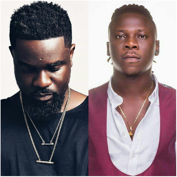 Modern Ghanaian Afrobeat artists Sarkodie and Stonebwoy performing on stage, representing the evolution of Afrobeat through hip-hop and dancehall influences.