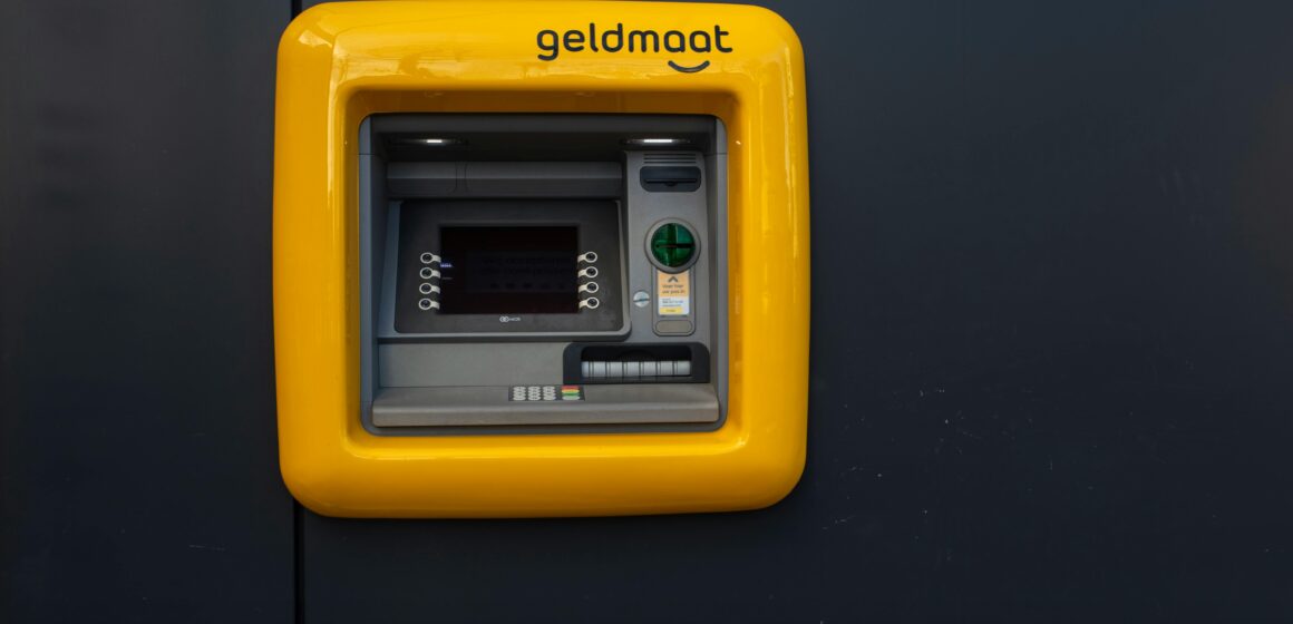 ATM with secure enclosure and lighting