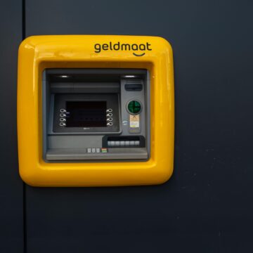 ATM with secure enclosure and lighting